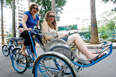 Cyclo (xich lo) is one of the best way to discover Hanoi