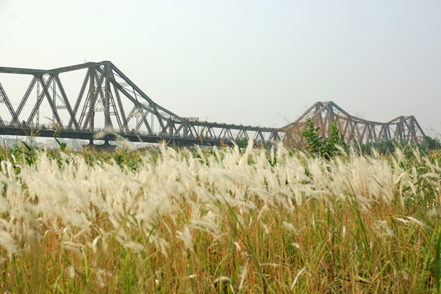View of Long Bien bridge from the bank of Red River