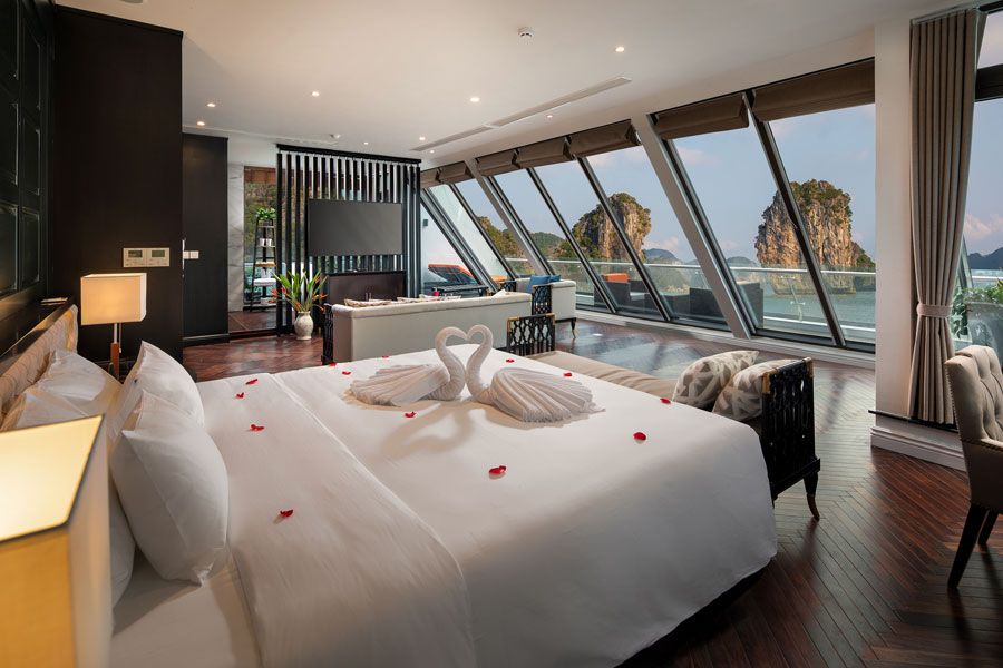 Stellar_s Cruise cabin with a balcony overlooking limestone islands